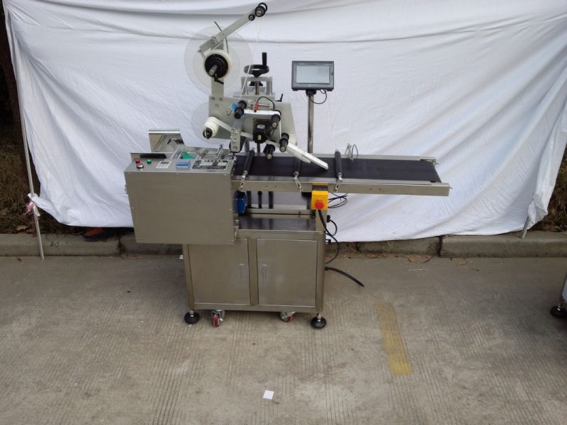 ម៉ាស៊ីនដាក់ក្រដាសរាបស្មើលើក្រដាសដាក់ដោយដៃនៅប្រទេសចិនដោយក្រុមហ៊ុនផ្គត់ផ្គង់ម៉ាកល្បីឈ្មោះតេតា